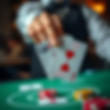 A close-up of a hand holding two cards showing a winning combination in Blackjack.